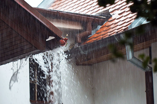 Overflowing Gutters with Rain - Uncommon Water Damage Prevention Tips to Save Your Home in Richmond